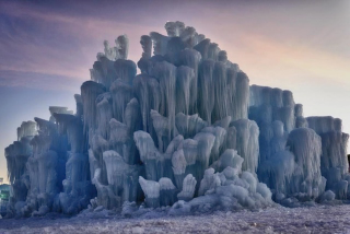 Illustration for article titled Glowing castles made from icicles look like something out of a wintery fairy tale